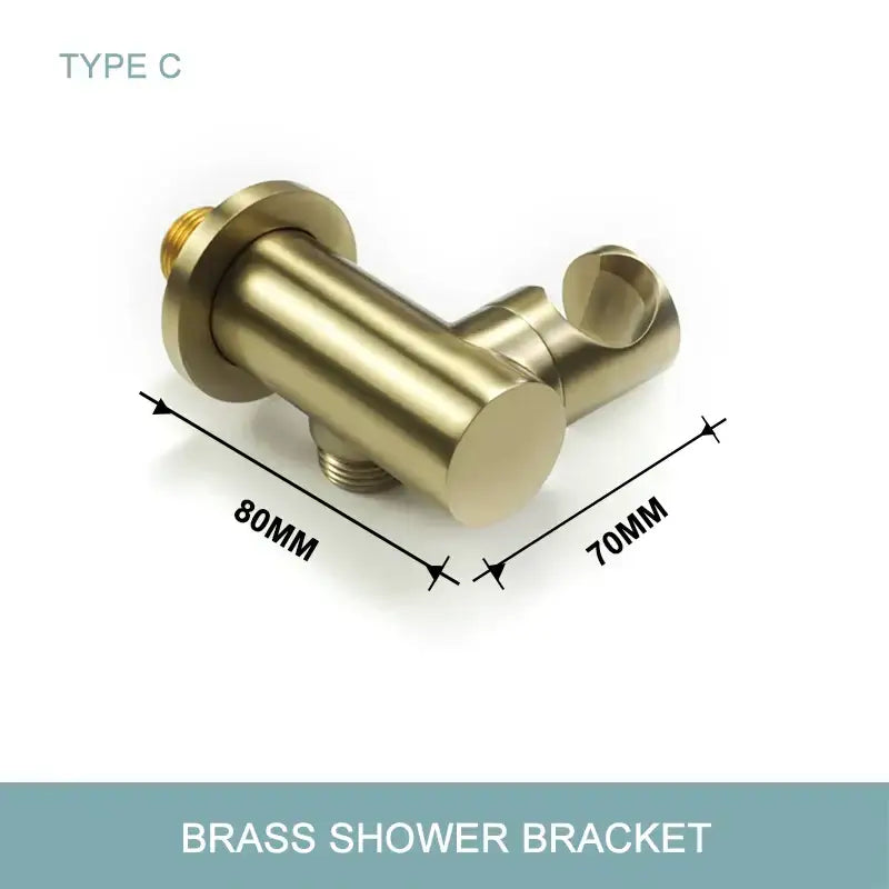 Brass shower bracket with sleek brushed gold finish and angular design for modern hand shower with stainless steel hose