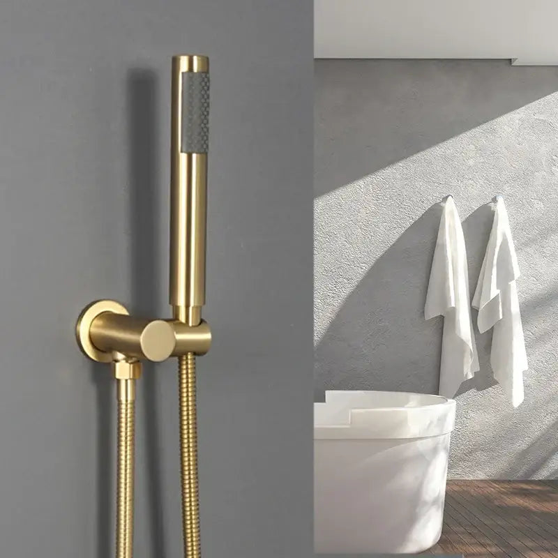 Modern brushed gold hand shower with textured spray face and flexible stainless steel hose for bathroom use