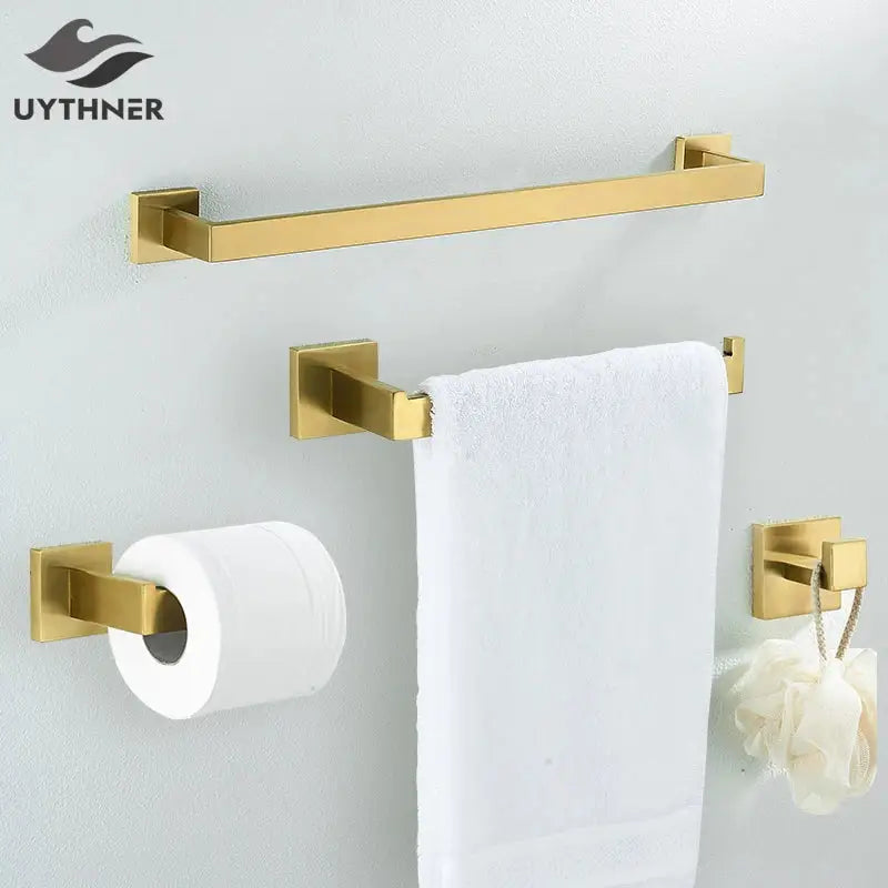 Modern brushed gold hardware set towel rail with gold-toned rectangular design and square mounting brackets decorbites brushed gold