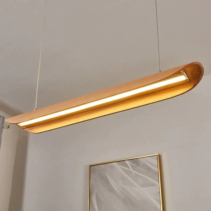 Modern brushed gold kitchen island light fixture featuring a wood chandelier design with integrated led strip for kitchens