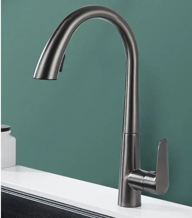 Modern brushed gold kitchen sink faucet with pull out spring spout and matte black curved sink faucet design