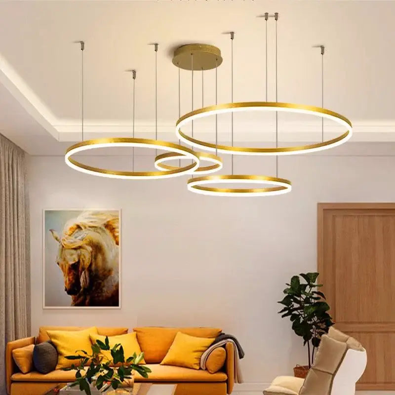 Modern brushed gold led chandelier with multiple concentric rings for dining room decorbites brushed gold finish