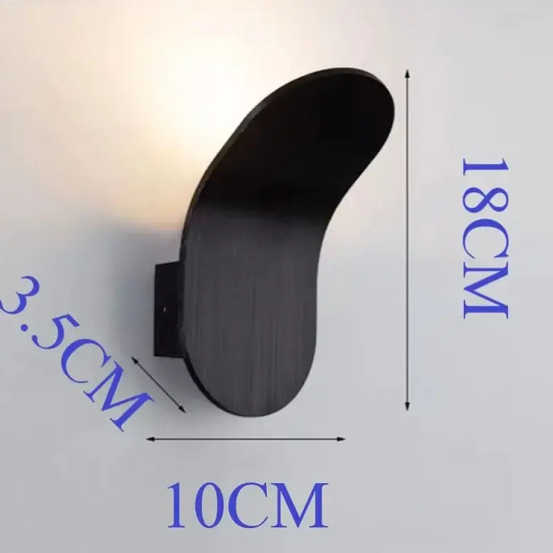 Black matte finished wall lamp with sleek curved design modern led wall lamp for living room use