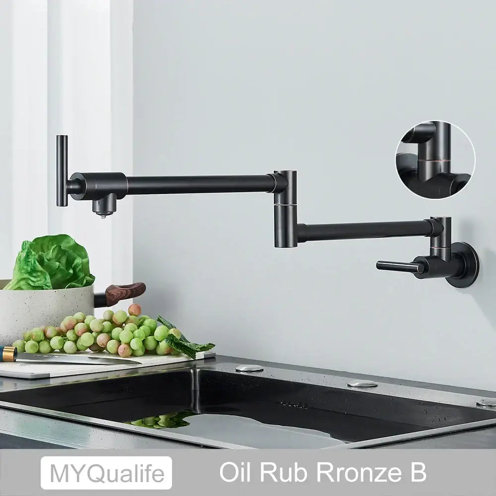Black oil-rubbed bronze pot filler faucet with sleek articulated design and dual handles for kitchen use