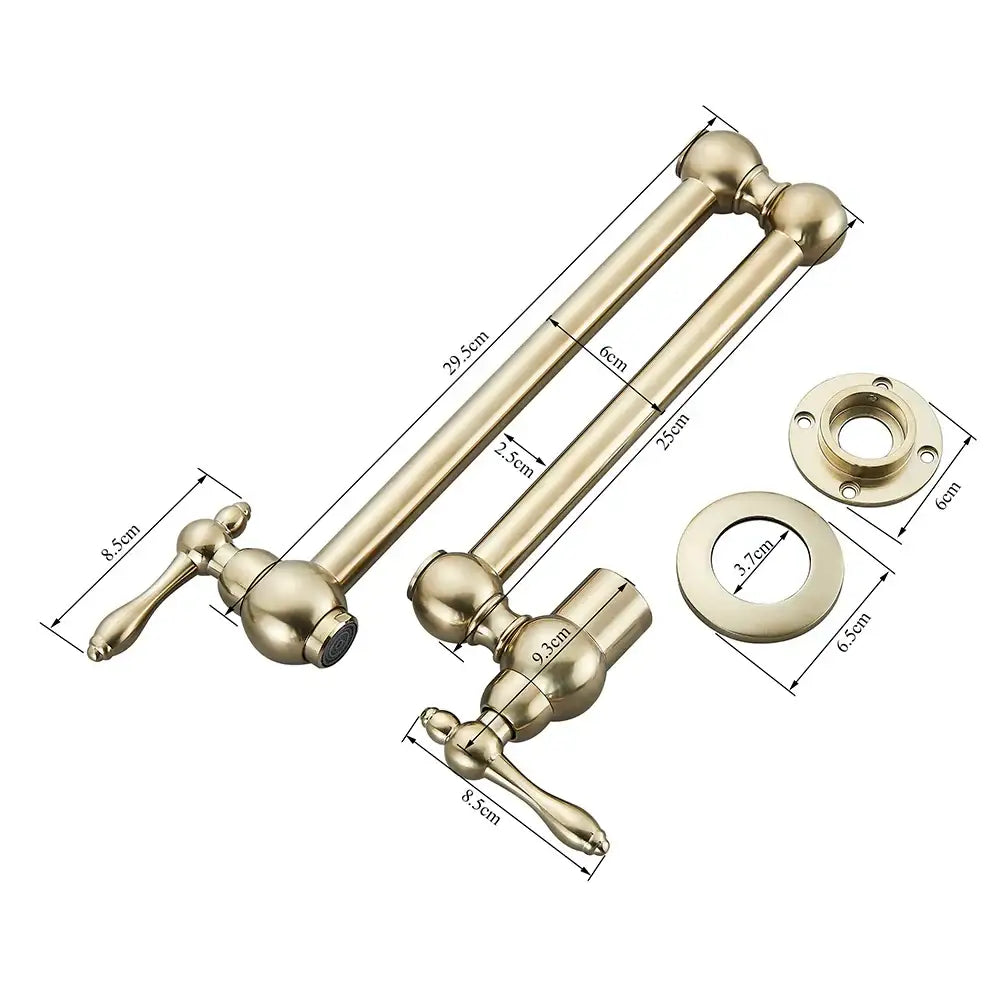 Modern brushed gold pot filler faucet with brass-finished folding spout and ornate spherical handles for kitchen use