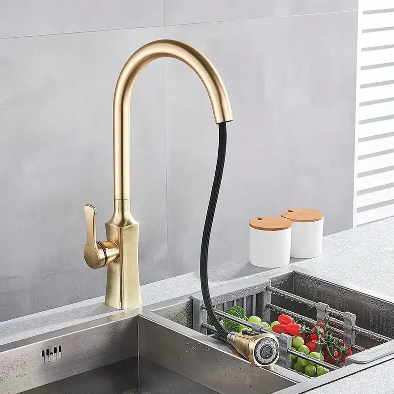 Modern brushed gold kitchen faucet with sleek curved spout and pull out spring spray head decorbites brushed gold