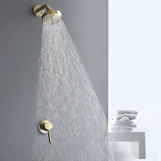 Modern brushed gold rainfall shower faucet set featuring a sleek gold-toned shower head and matching control valve