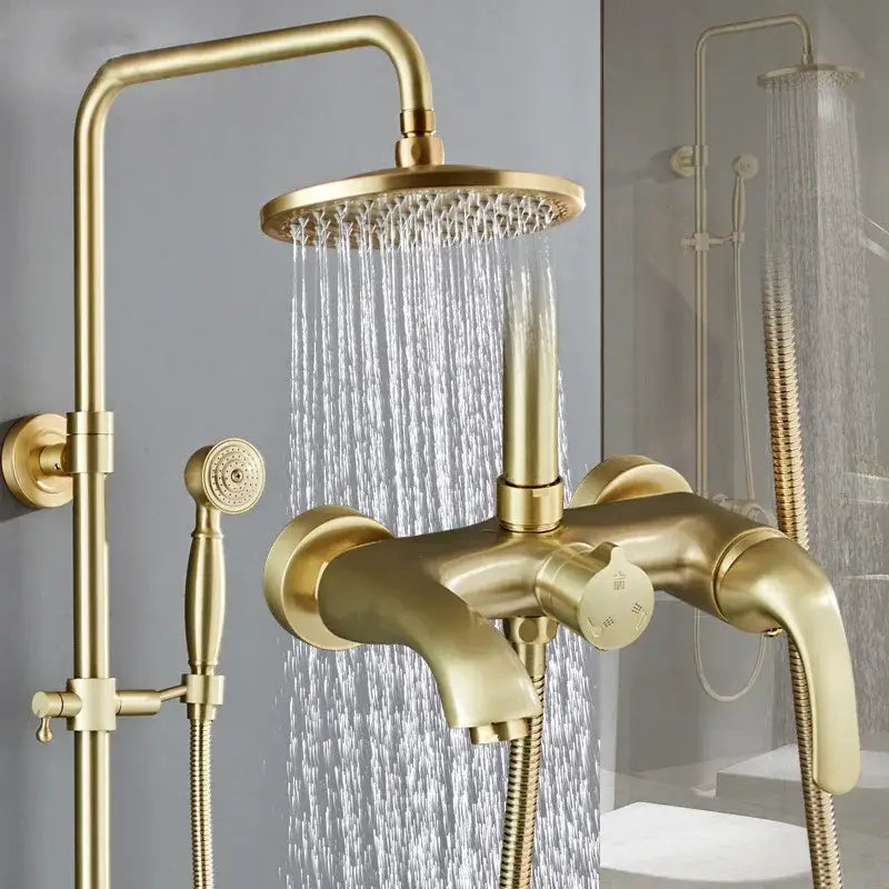 Modern brushed gold rainfall shower set with bathtub faucet in brass featuring large rainhead and handheld sprayer decorbites brushed gold