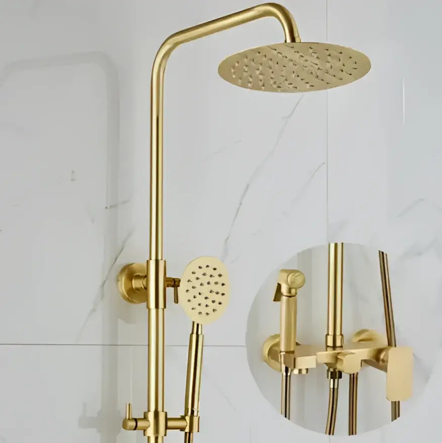 Modern brushed gold shower faucet set with a round rainhead and handheld sprayer in a sleek metallic finish