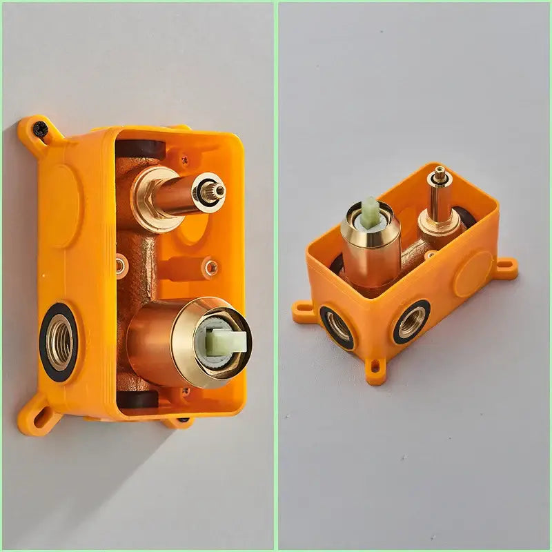 Orange plastic wall-mounted shower valve assembly with brass fittings and white ceramic handle for decorbites brushed gold shower