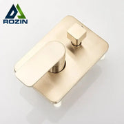 Modern brushed gold shower mixer control valve with rectangular wall-mounted design and two distinct control knobs
