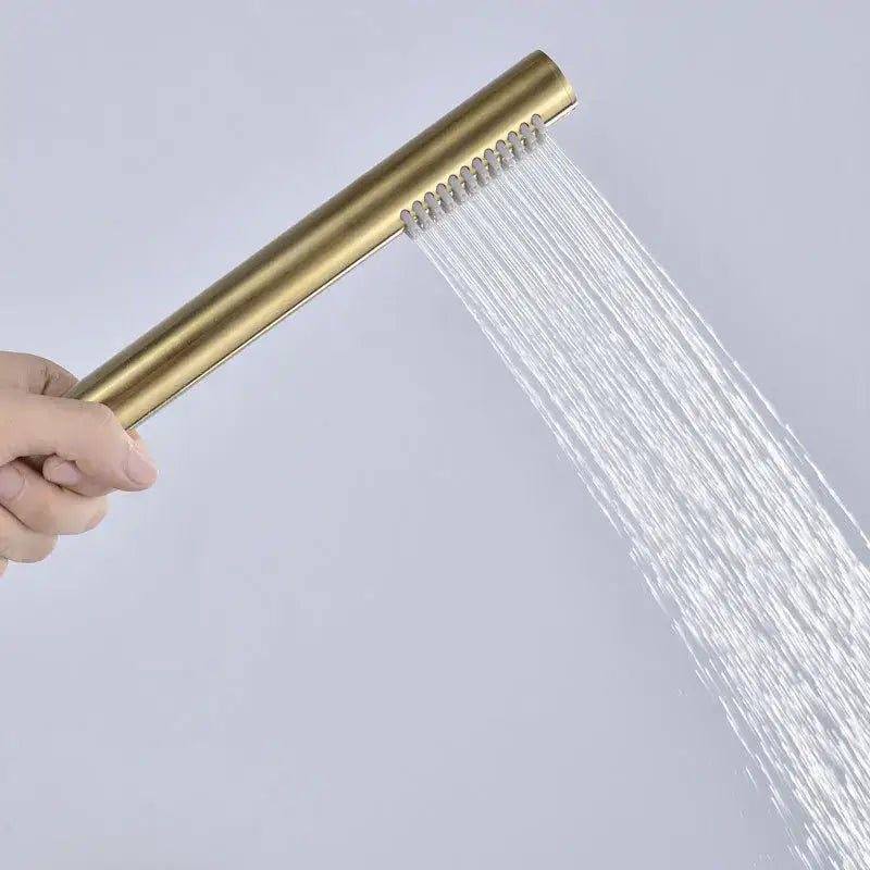 Modern brushed gold shower mixer set with a sleek rectangular showerhead featuring multiple water jets