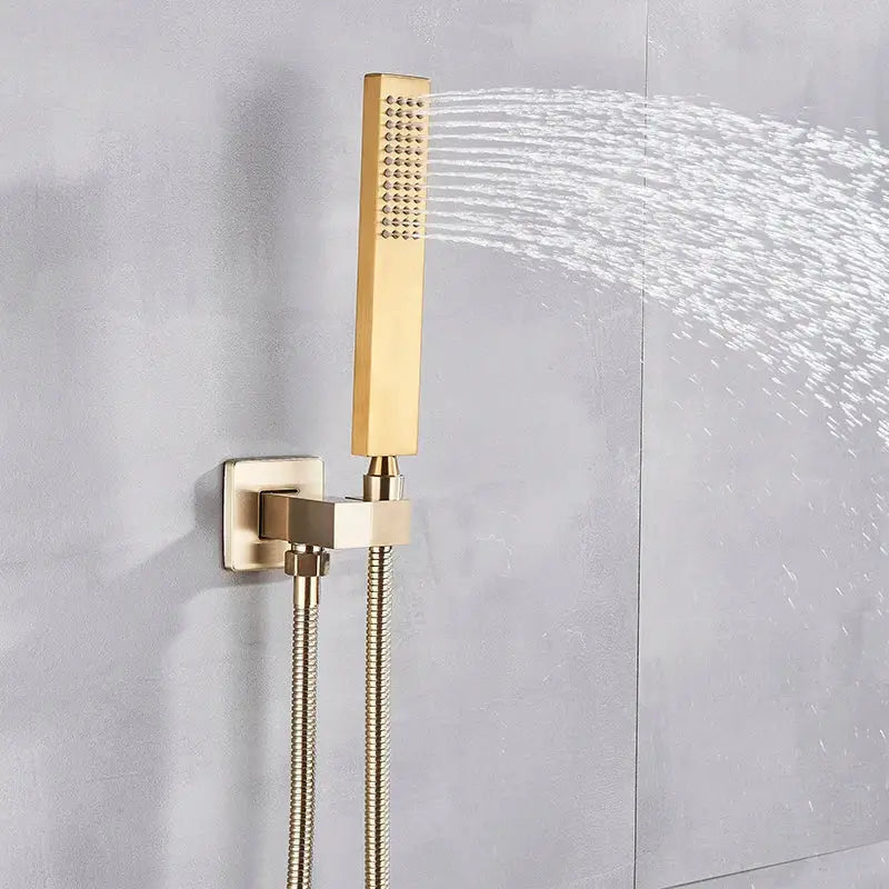 Modern brushed gold shower mixer with rectangular rainfall showerhead and flexible braided hose in brushed gold finish