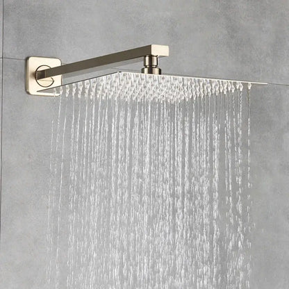 Modern brushed gold shower mixer with rainfall head featuring a brushed nickel square showerhead and minimalist design