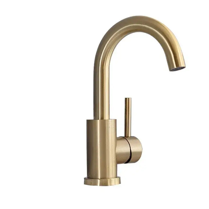 Modern brushed gold single handle basin faucet with a sleek curved spout and minimalist brass-finished design