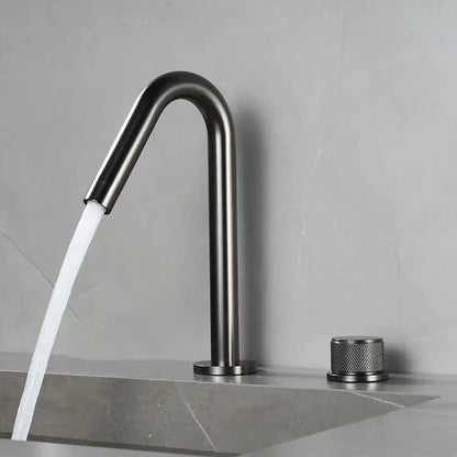 Modern brushed gold single handle bathroom basin faucet with matte black curved spout and premium ceramic valve