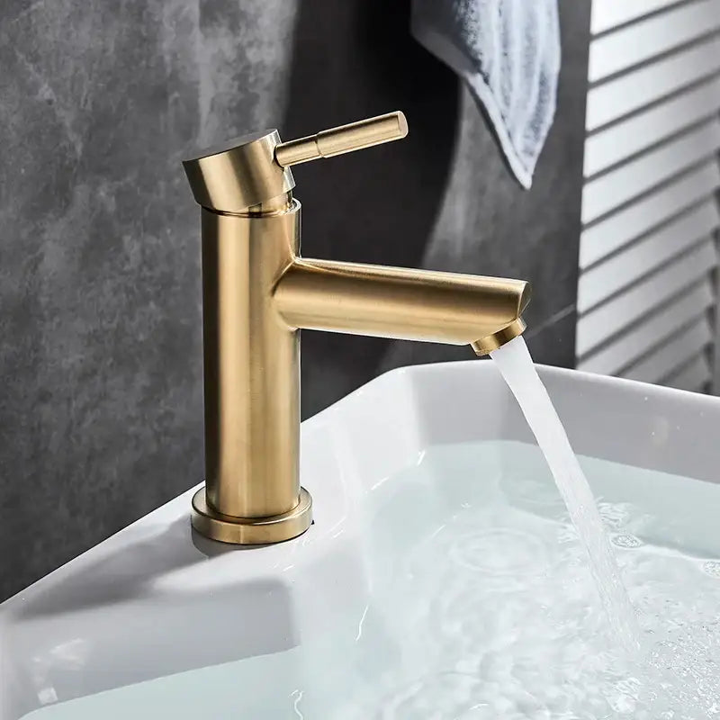 Modern brushed gold solid brass single-handle bathroom faucet with a sleek decorbites brushed gold design