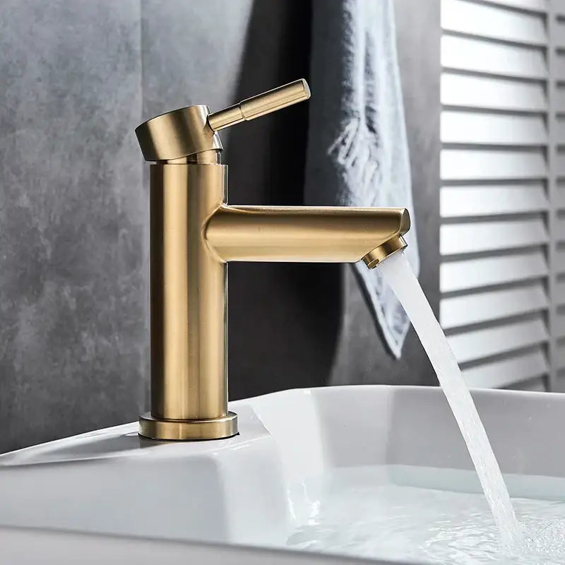 Modern brushed gold solid brass bathroom faucet with single handle tap and sleek minimalist design by decorbites brushed gold