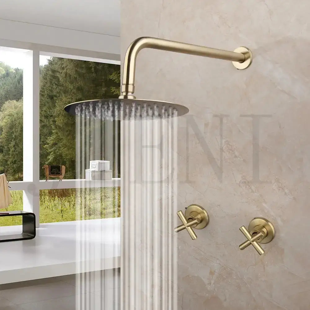 Brass-finished rain shower head with matching cross-handle faucets in a modern brushed gold square rainfall shower set
