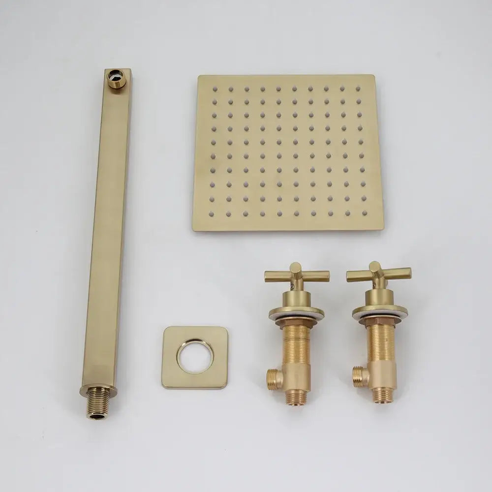 Modern brushed gold square rainfall showerhead with gold-toned finish and grid of evenly spaced perforations