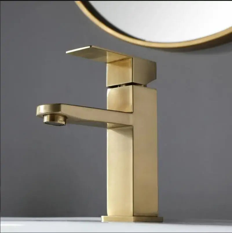 Modern brushed gold stainless steel basin mixer faucet with sleek geometric design for bathroom decorbites brushed gold