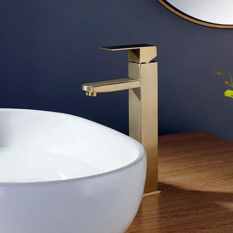 Modern brushed gold stainless steel basin mixer faucet with a sleek geometric design and decorbites brushed gold finish