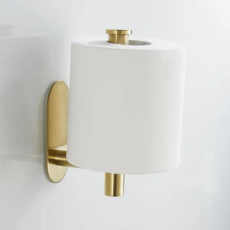 Modern brushed gold stainless steel toilet paper holder wall mounted with sleek design holding white toilet paper roll