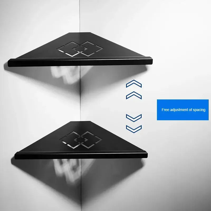 Black triangular corner shelves with brushed gold stainless steel finish and subtle geometric cutouts for shower storage