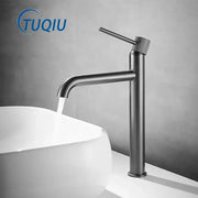 Matte black tuqiu brand single-handle bathroom faucet with textured knob paired with decorbites brushed gold swivel design