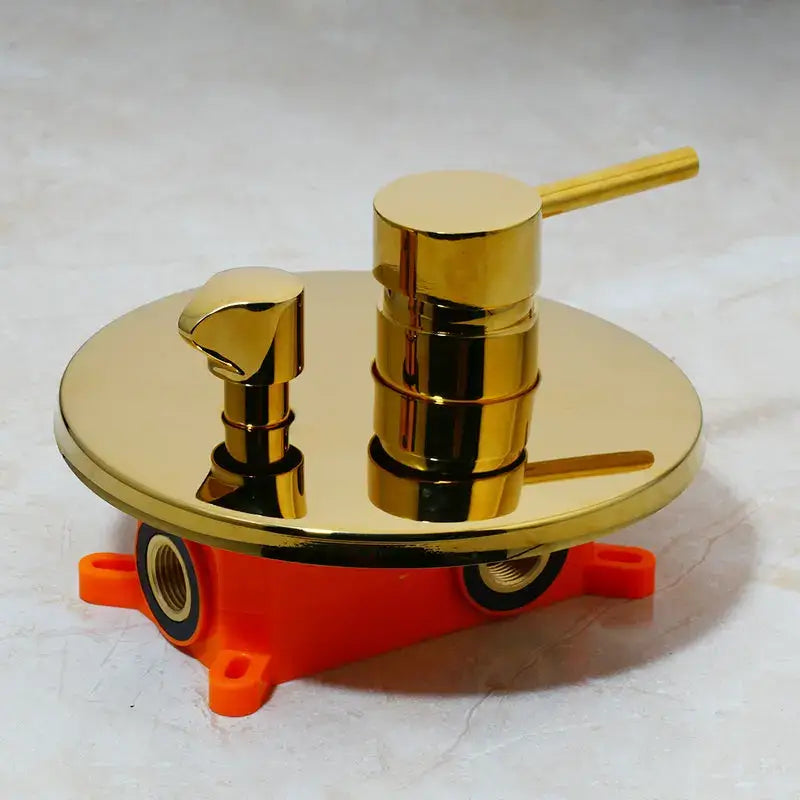Modern brushed gold tub faucet with handheld shower and orange mounting base for shower tub bathroom mixer assembly