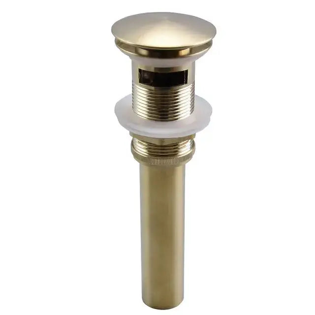 Brass-finished bathroom sink drain with a sleek cylindrical body and threaded connections for brushed gold faucets