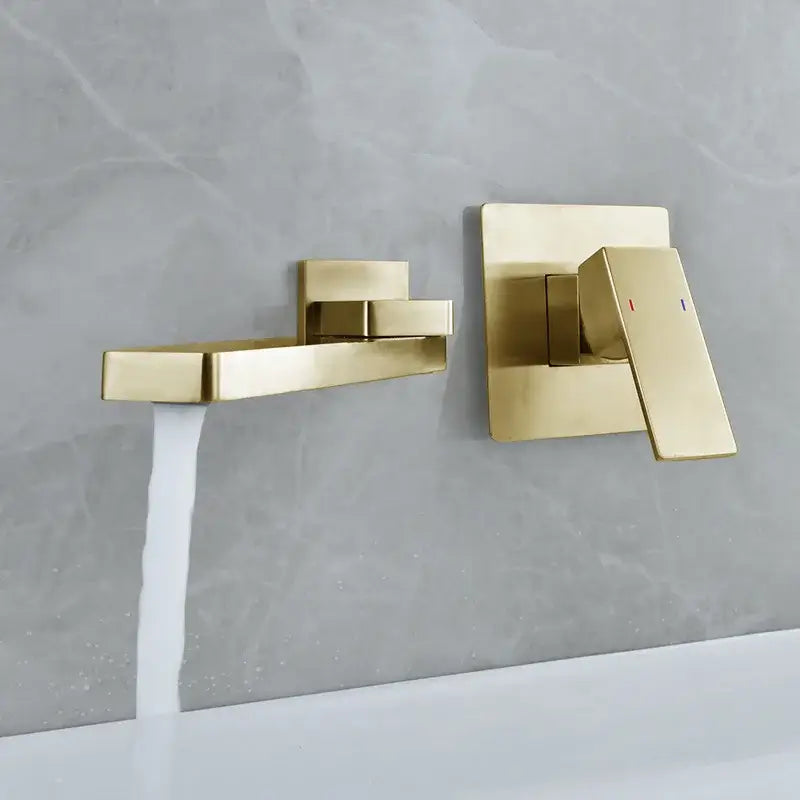 Modern brushed gold basin faucet set with sleek rectangular wall-mounted design and dual control handles for bathroom use
