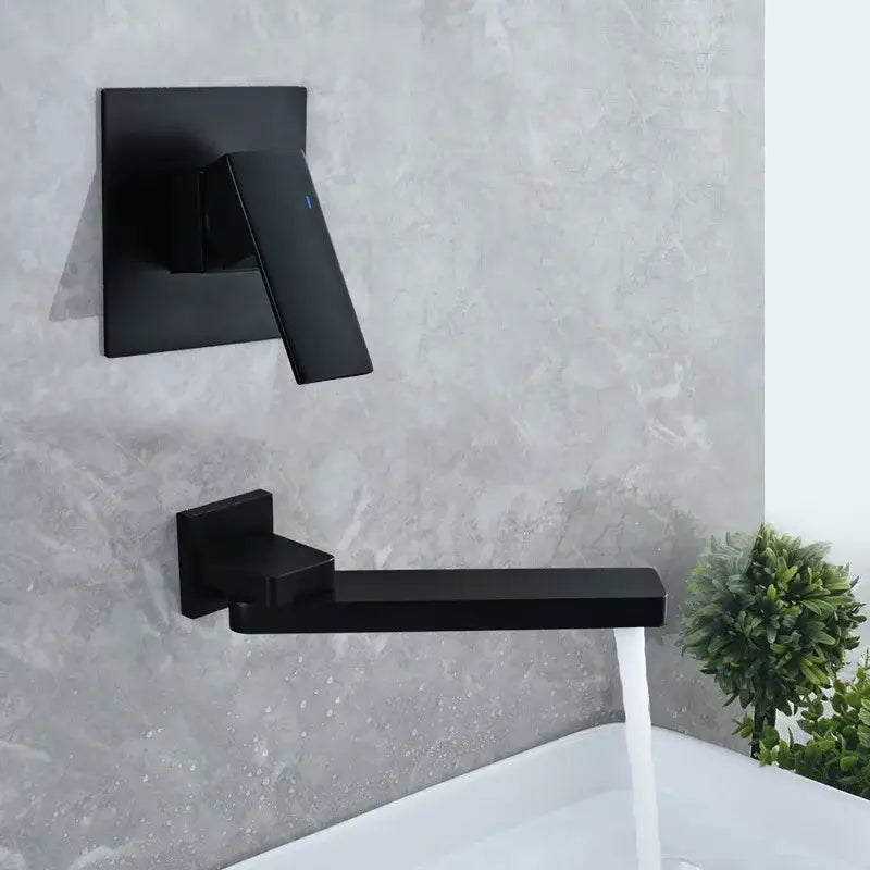 Modern black matte basin faucet set with sleek rectangular spout and square wall-mounted handle for bathroom use