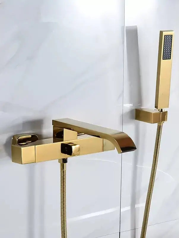 Modern brushed gold wall mounted waterfall bathtub set with decorbites brushed gold finish and matching handheld showerhead