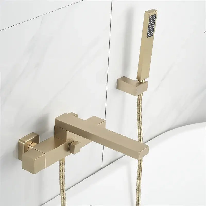Modern brushed gold wall mounted waterfall bathtub set with sleek gold wall mounted faucet and handheld showerhead