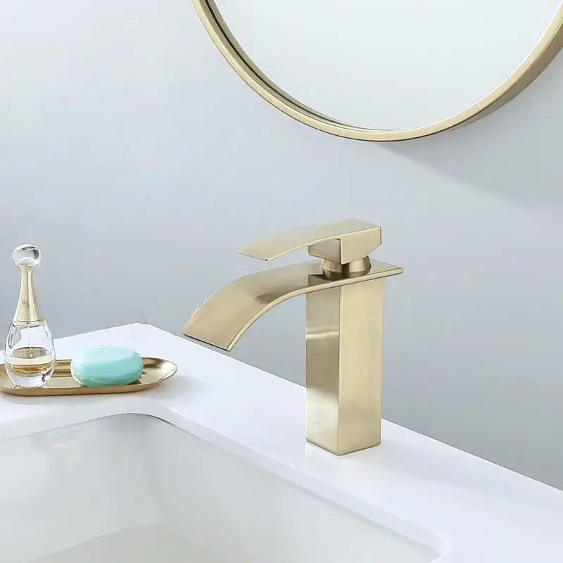 Modern brushed gold basin faucet with sleek rectangular spout and single handle by decorbites for bathroom use