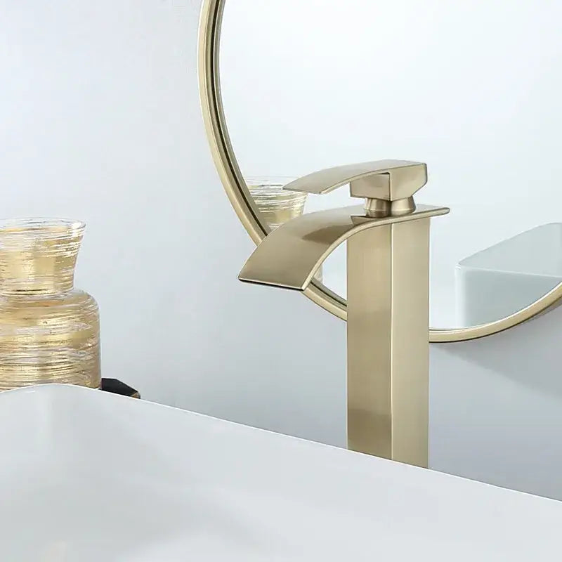 Modern brushed gold basin faucet with sleek angular waterfall design and decorbites brushed gold finish for bathroom