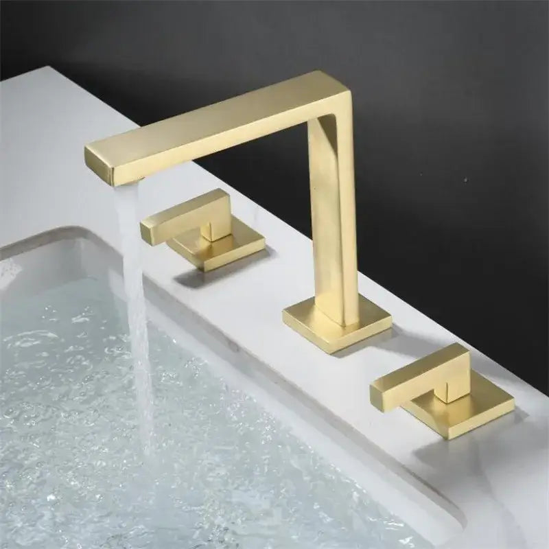 Modern brushed gold basin faucet with rectangular spout and two square handles for minimalist bathroom decorbites design