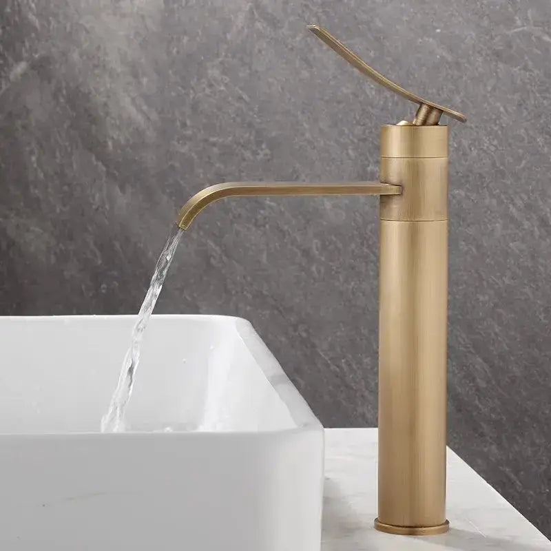 Modern brushed gold waterfall basin mixer in bronze bathroom sink tap with single-handle minimalist design