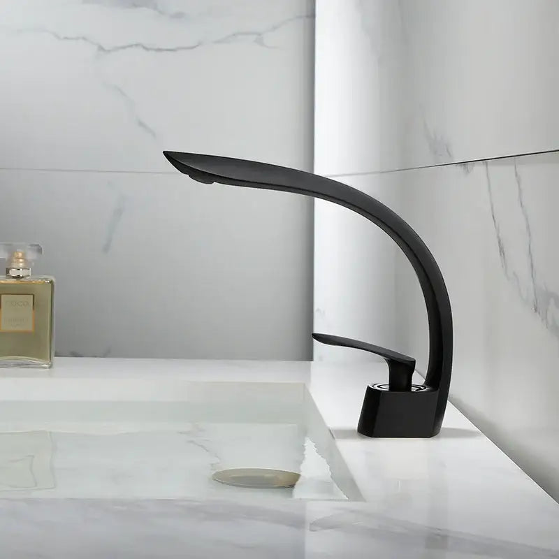 Modern black matte finish basin mixer tap with sleek curved design for bathroom use