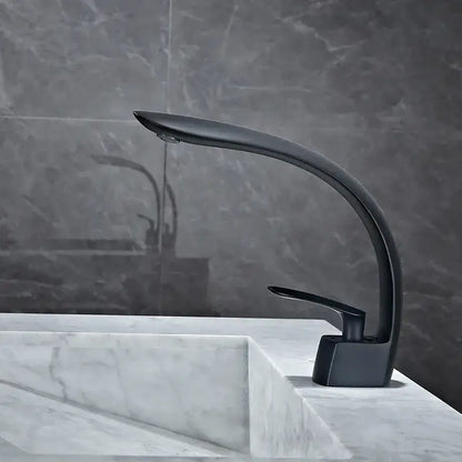 Modern black matte basin mixer tap with sleek curved spout and minimalist design for bathroom use
