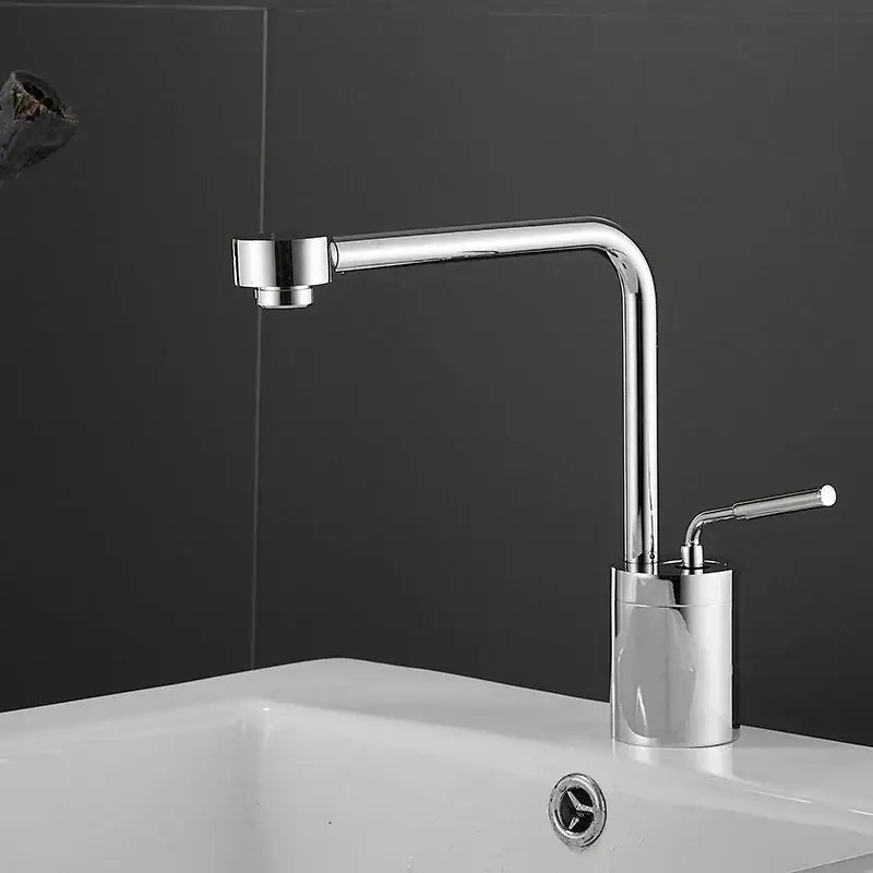 Modern chrome-finished kitchen faucet with sleek curved spout and cylindrical base for faucet swivel sink use