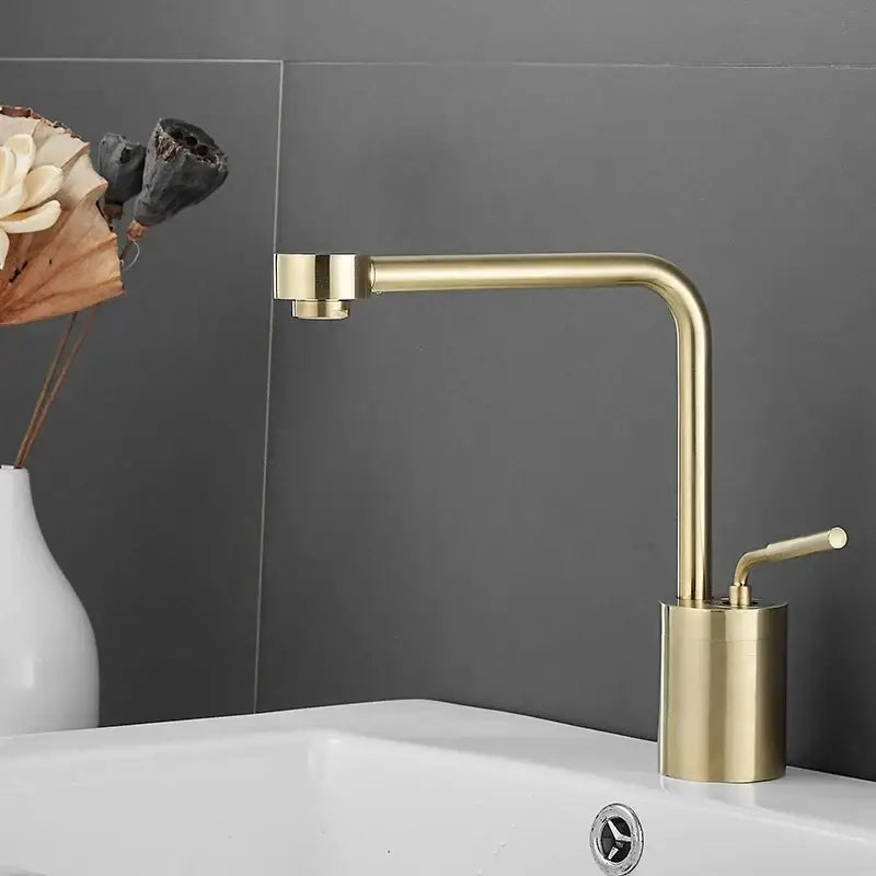 Modern brushed gold faucet swivel sink with a sleek waterfall design and cylindrical base by decorbites brushed gold