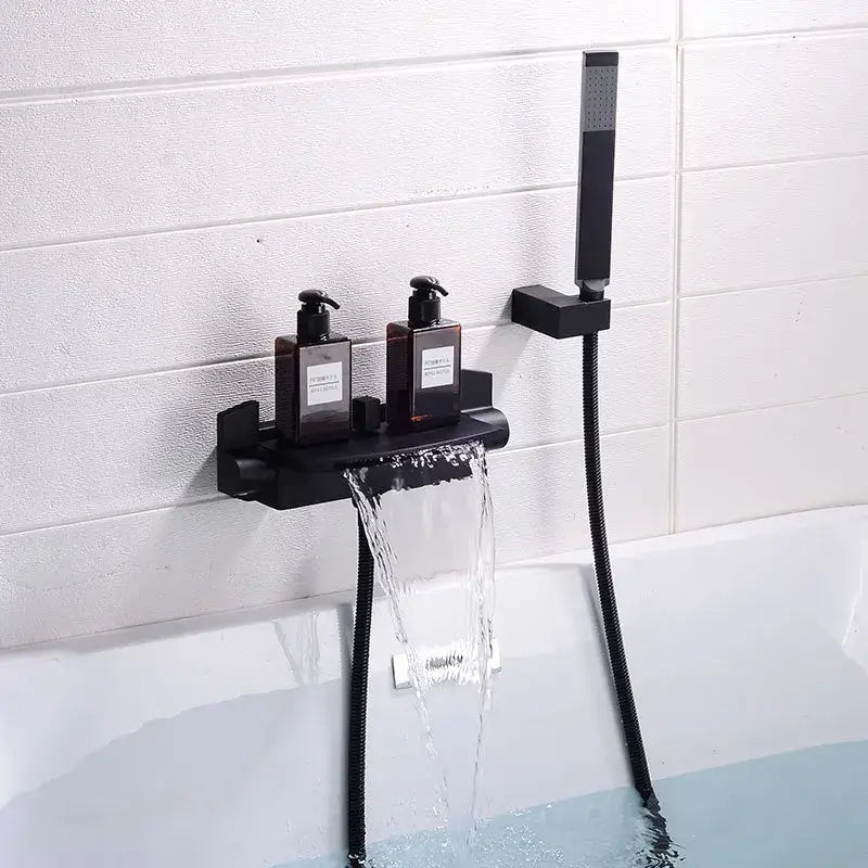 Black matte waterfall shower faucet set with integrated soap dispenser shelf and handheld spray head for modern bathrooms