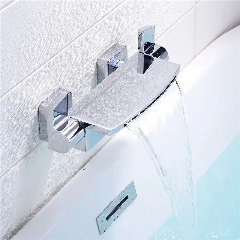 Modern chrome-finished waterfall bathtub faucet with sleek dual handles for a contemporary shower faucet set design