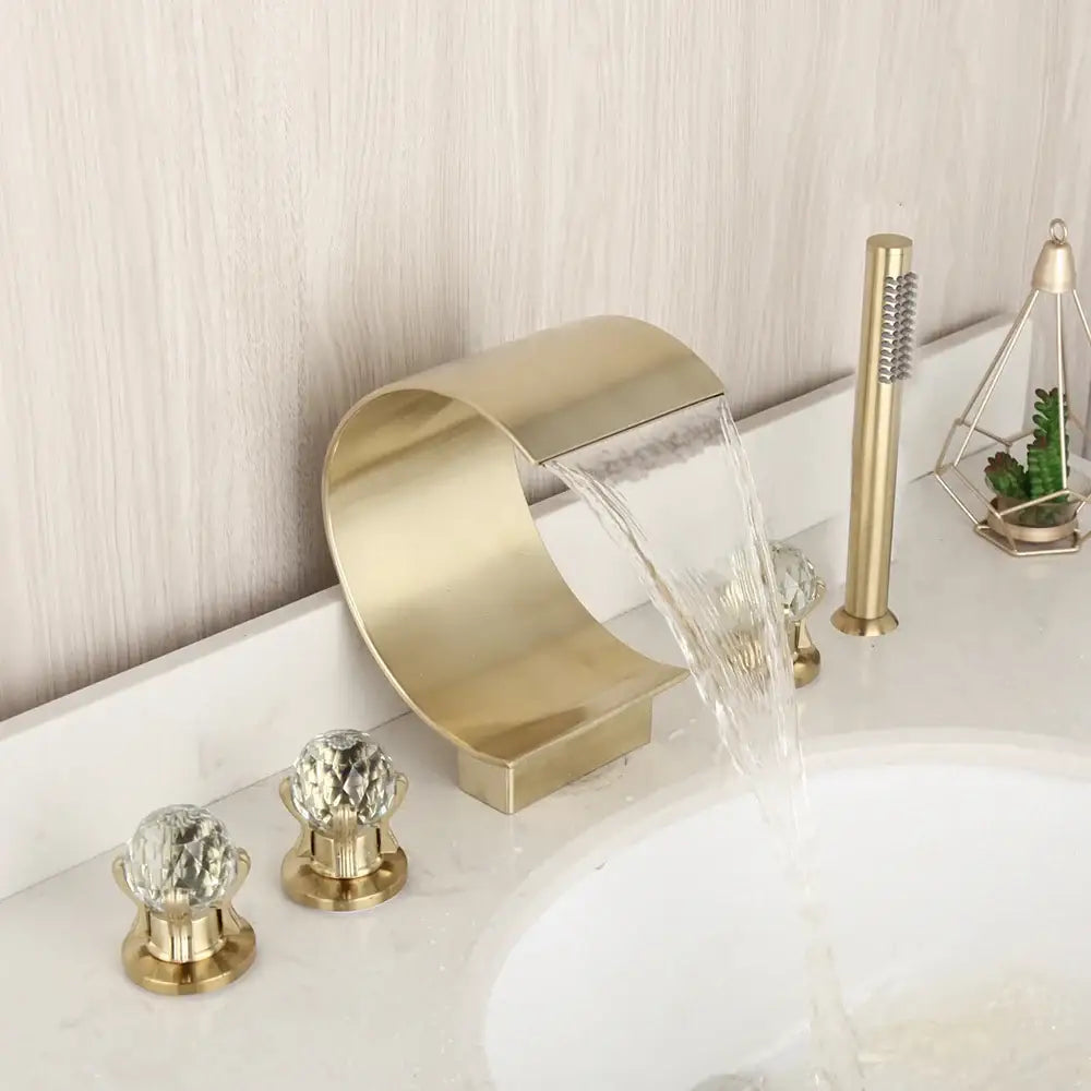 Modern brushed gold waterfall shower faucet with wall mounted single handle and crystal knob handles in sleek design
