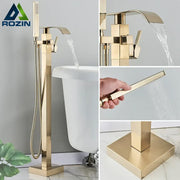 Modern brushed gold tub faucet with waterfall spout and handheld showerhead from decorbites brushed gold collection