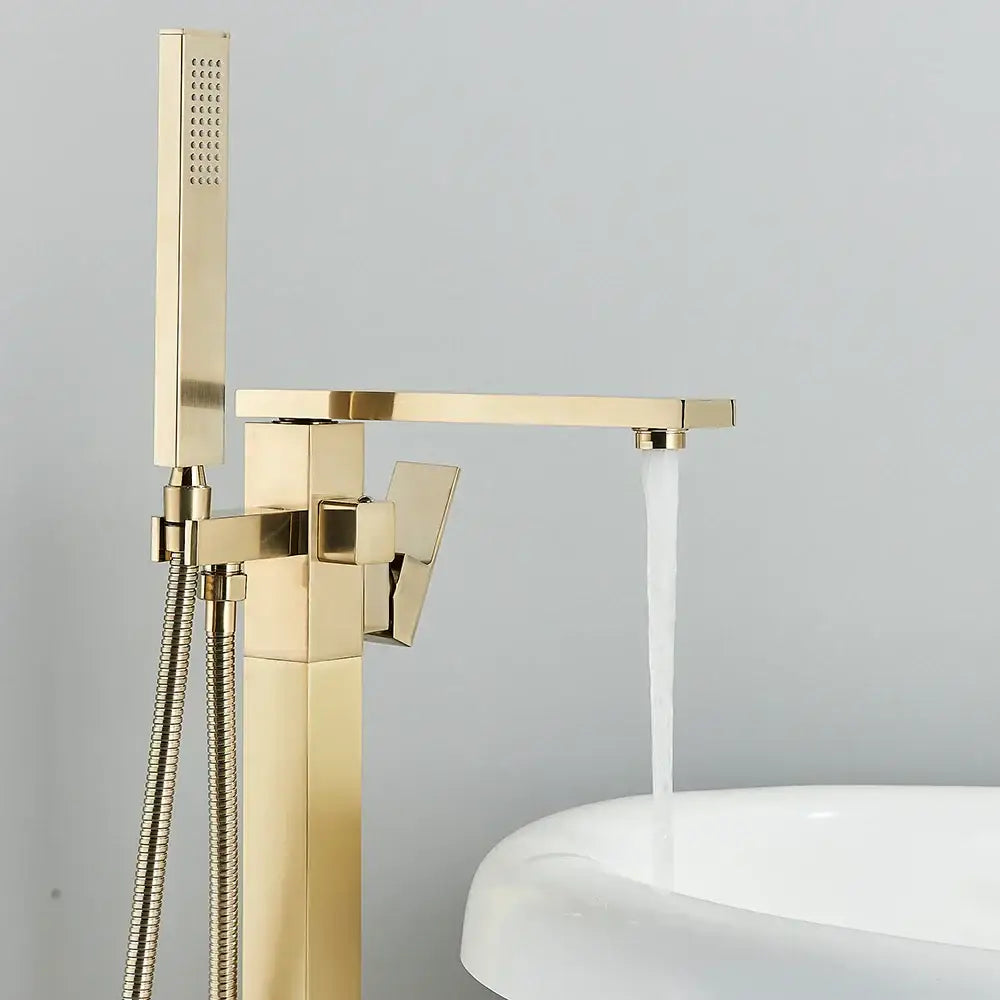 Modern brushed gold waterfall tub faucet with integrated handheld shower and flexible hose in brushed gold decorbites style