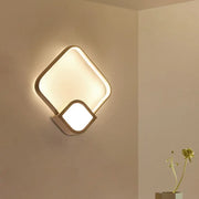 Modern brushed gold wall sconce with acrylic square panels in warm white LED and maximum bulb wattage 15w
