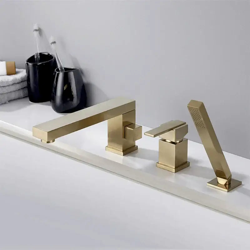 Modern brushed gold widespread shower faucet with sleek geometric design and integrated handheld showerhead decorbites brushed gold
